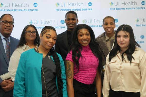 Residents pose for a picture after graduating from Dental Assistant Program