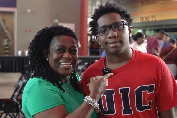 Demarion Brown (right) poses with his mother at the 2023 Take Flight event