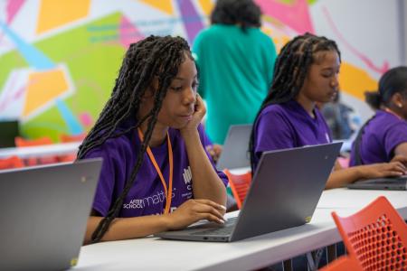 Students sitting at desk during a class.